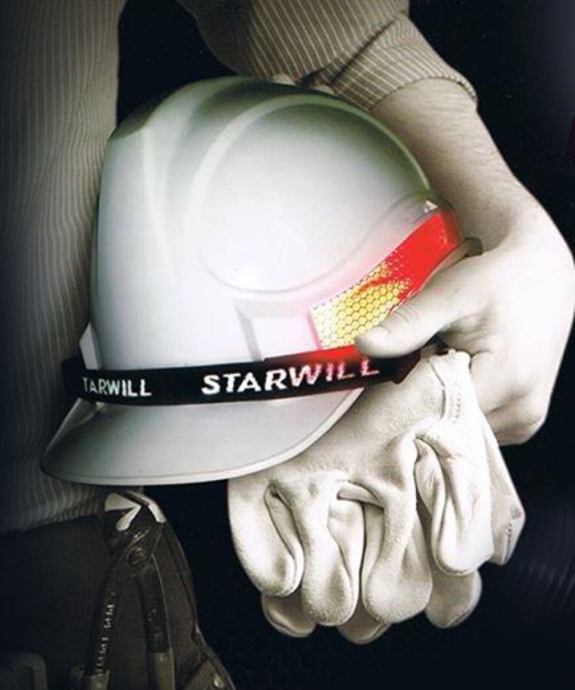STARWILL Professional Series safety helmet held with work gloves